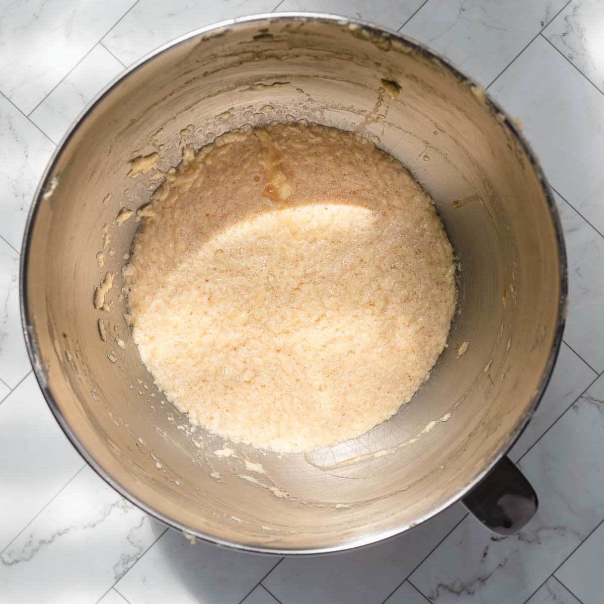 Mixing ingredients to make lamingtons.