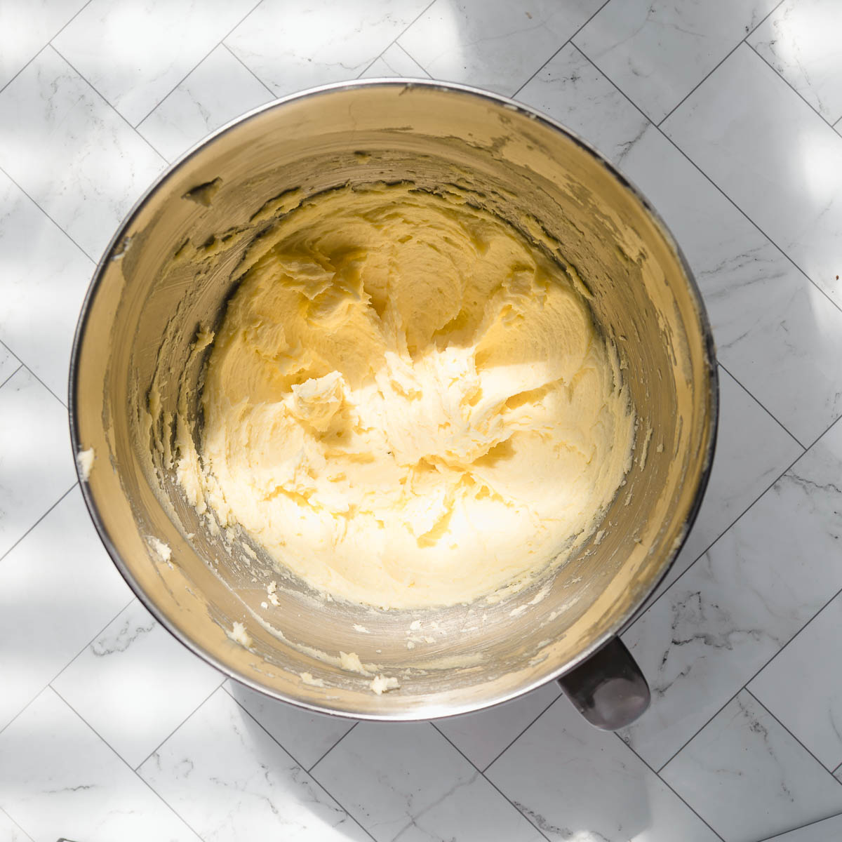 Mixing ingredients to make lamingtons.