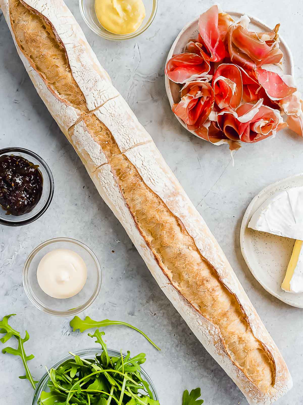 Ingredients needed to make a french baguette sandwich.