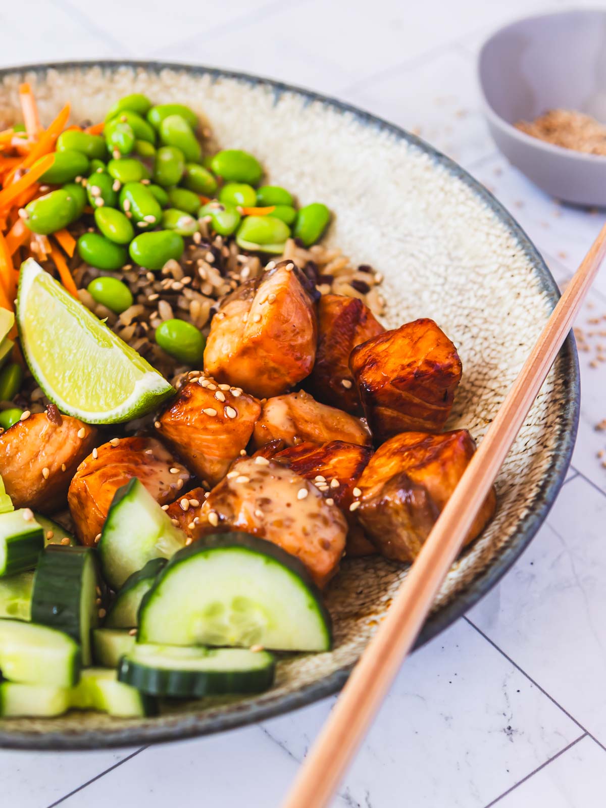 Sticky honey soy salmon bowls can be customised with your favourite vegetables.