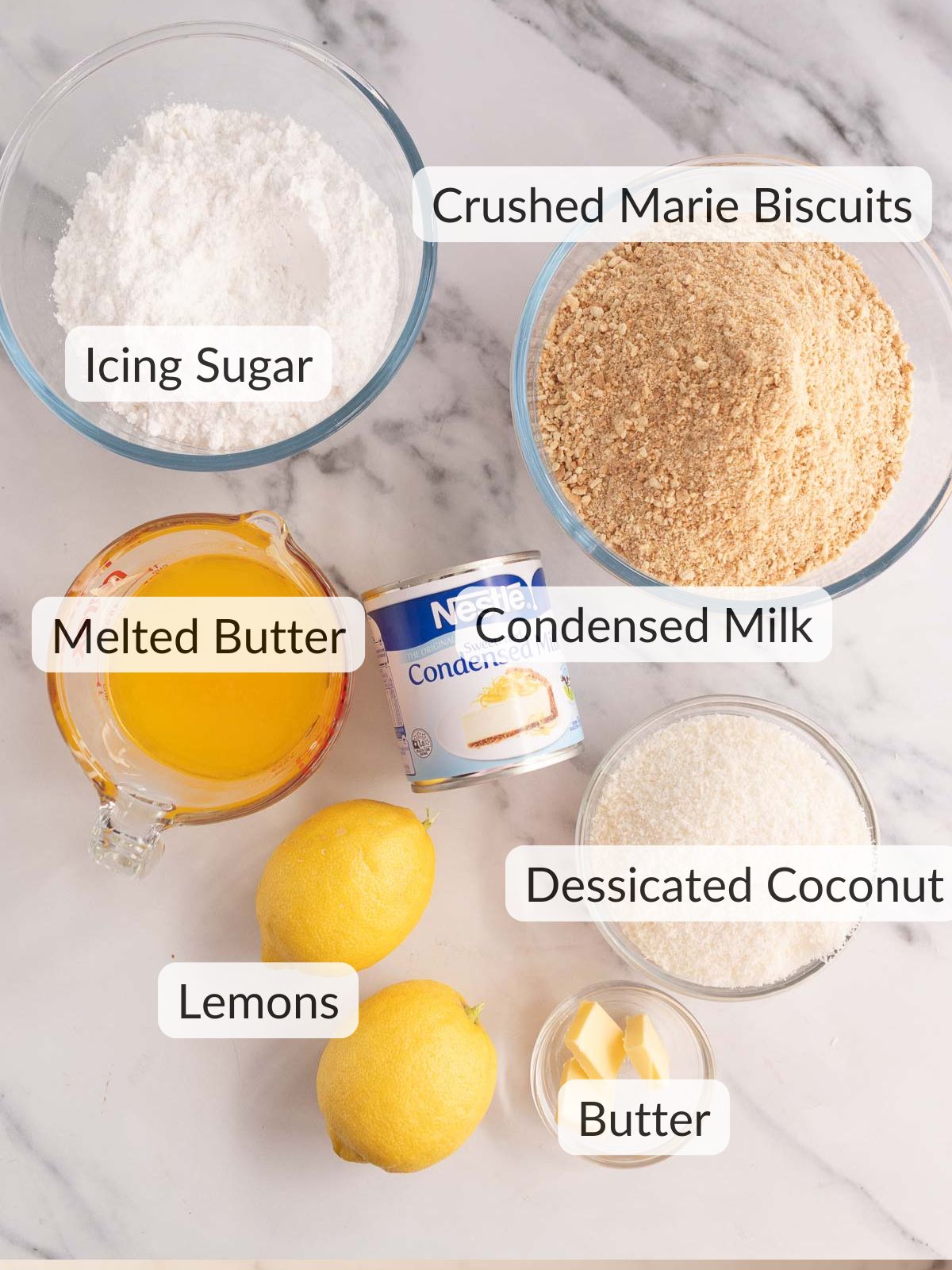 Ingredients needed to make a creamy lemon coconut slice.
