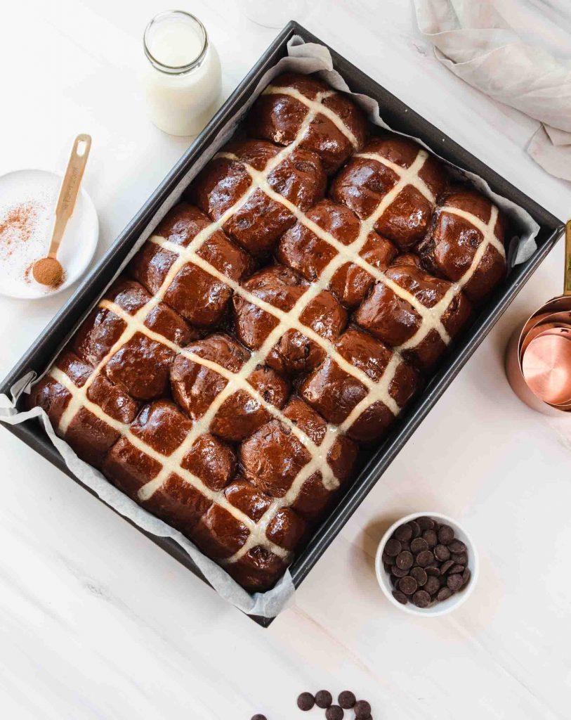 overhead shot of chocolate easter buns in baking pan
