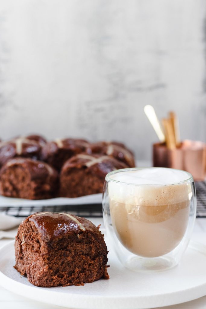 chocolate chip hot cross bun with coffee