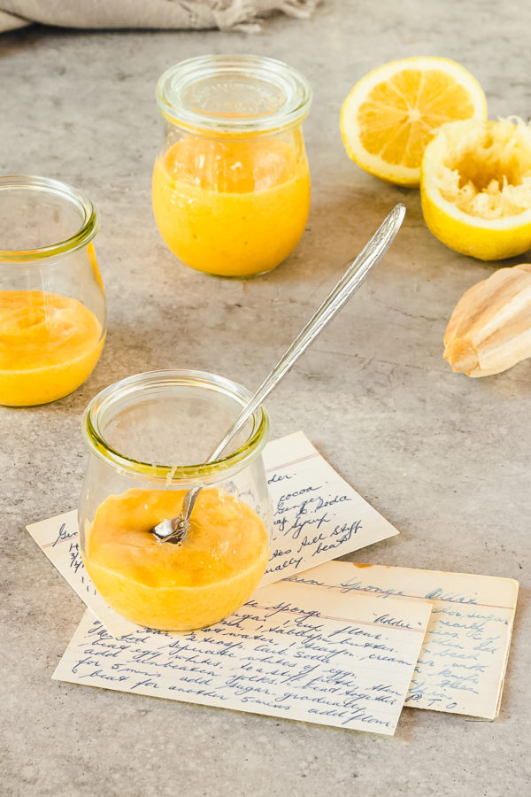 jars of lemon curd with vintage recipe cards