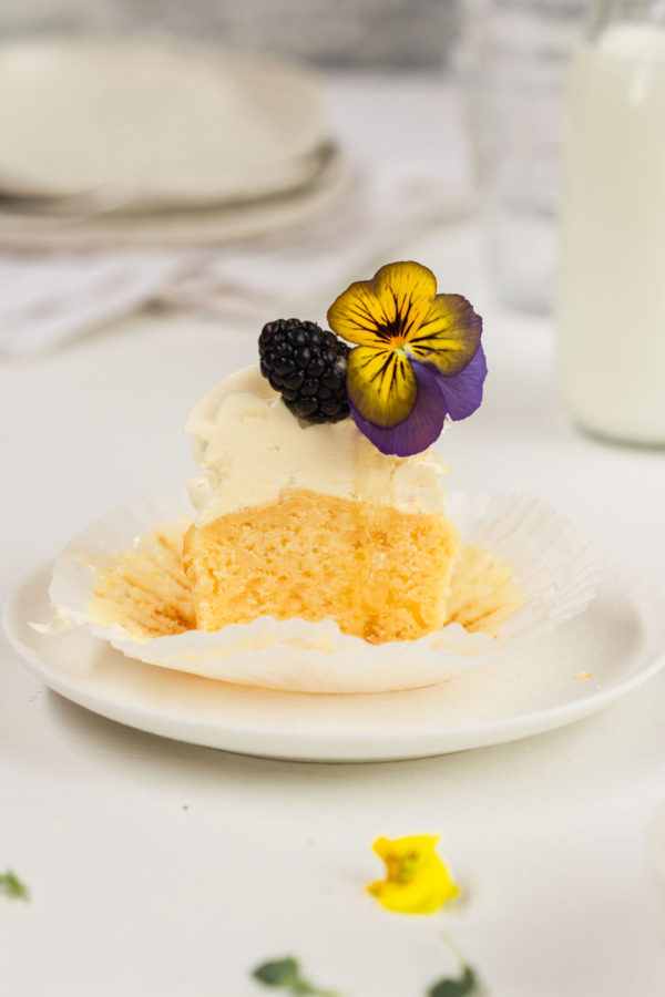 fluffy lemon ricotta cupcake with honey meringue frosting