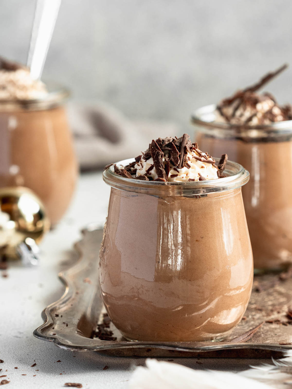Light and airy no-bake Toblerone mousse in glass jars, ready to serve as an easy make-ahead dessert.