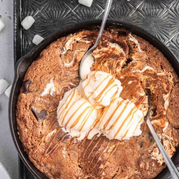 close up of skillet cookie with ice cream