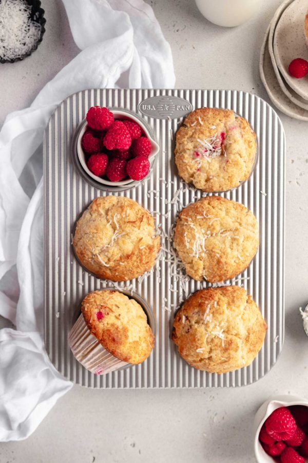 tray of 5 muffins with raspberries