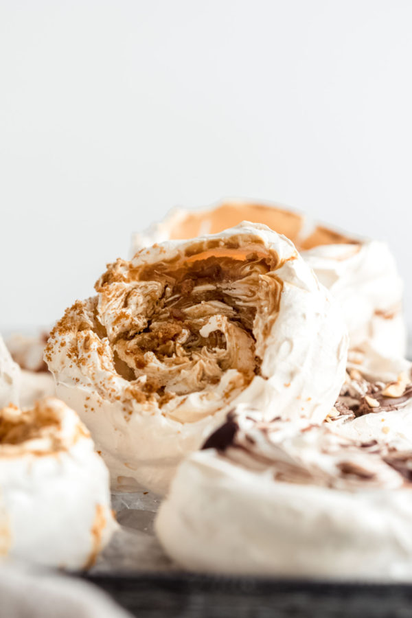 meringue cookies with biscoff topping and crushed biscuits