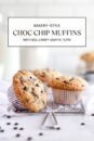 A tray of baked muffins with chocolate chips.