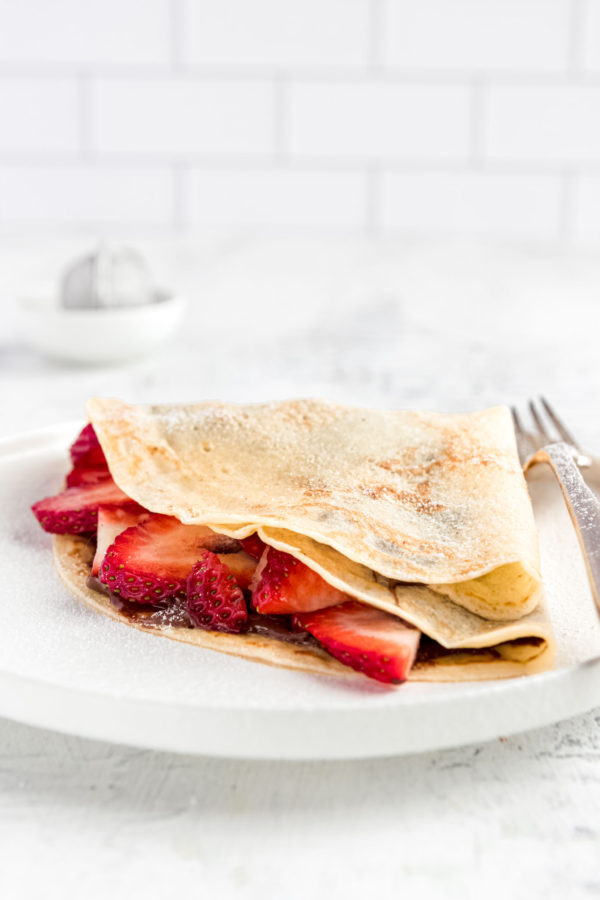 french crepe filled with strawberries