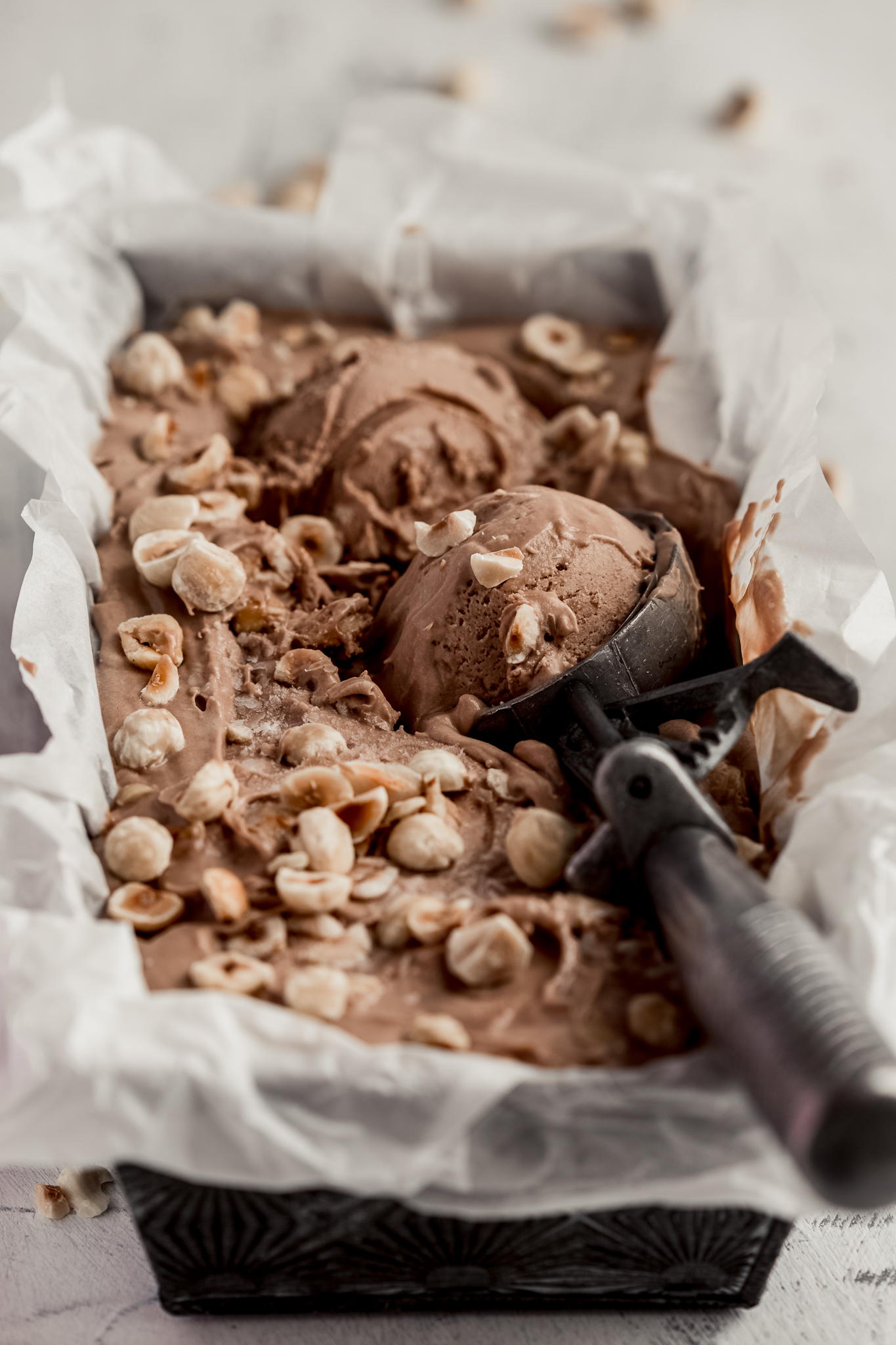 vintage scoop in nutella ice cream with roasted hazelnuts