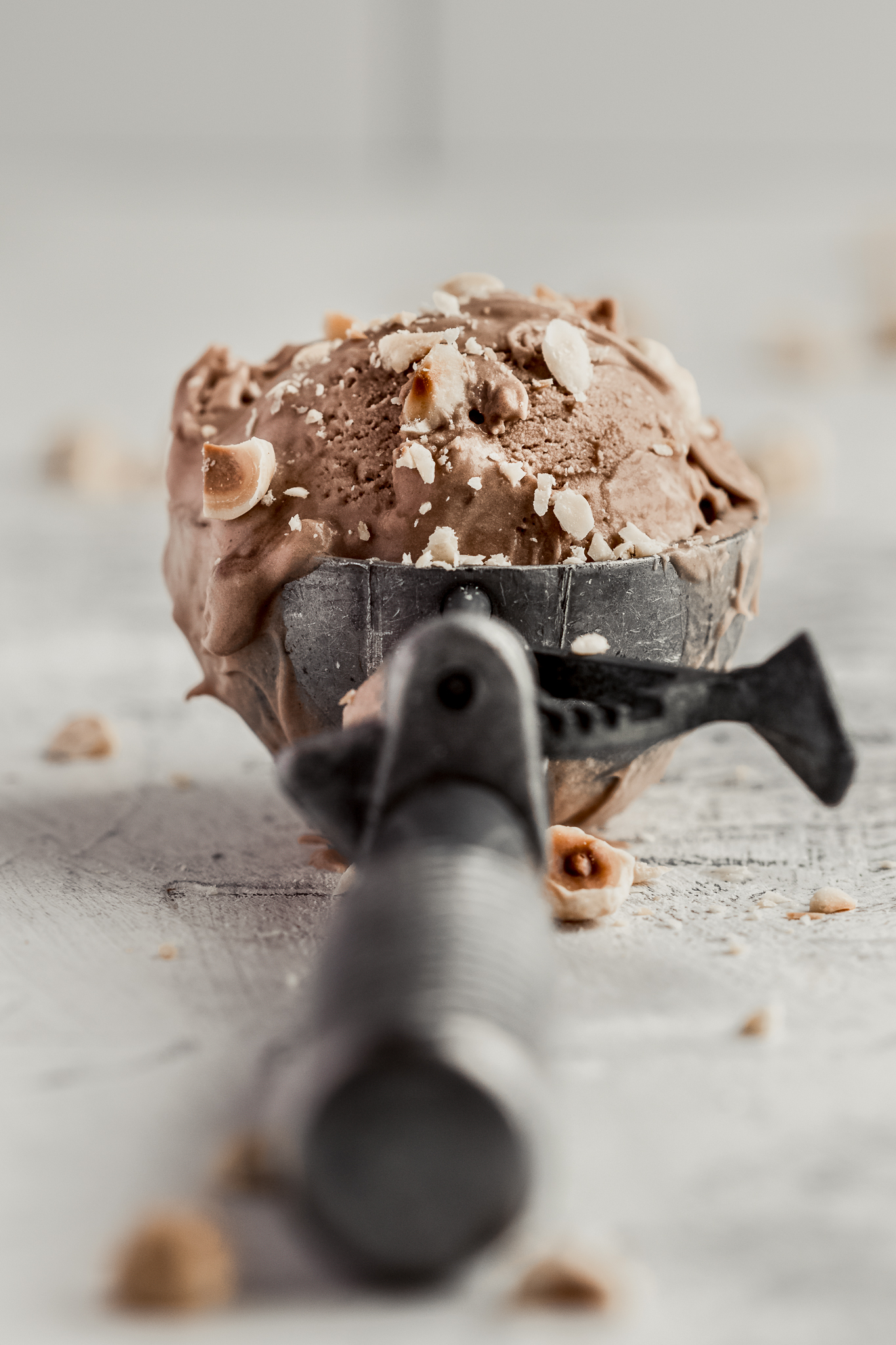 single scoop of nutella ice cream in a vintage scoop