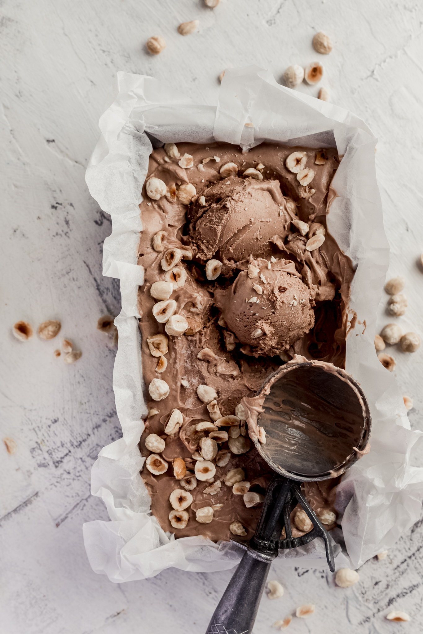 nutella ice cream in a vintage tray with a vintage scoop