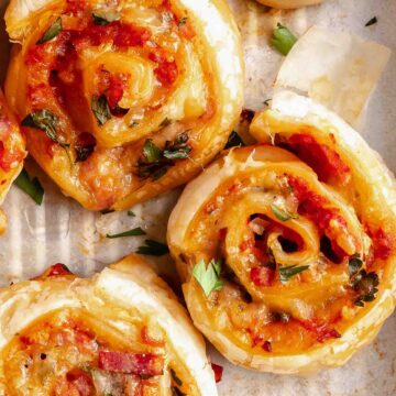 close up overhead shot of 3 pizza pinwheels