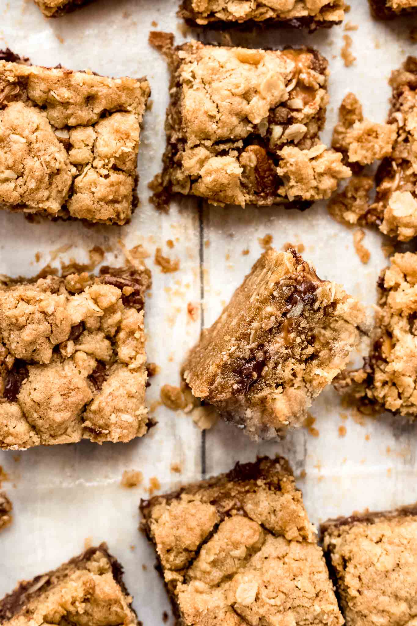 overhead shot of biscoff pecan cookie bars, with one on it's side