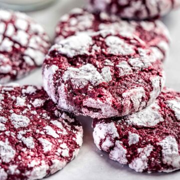 6 red velvet cookies on a tray