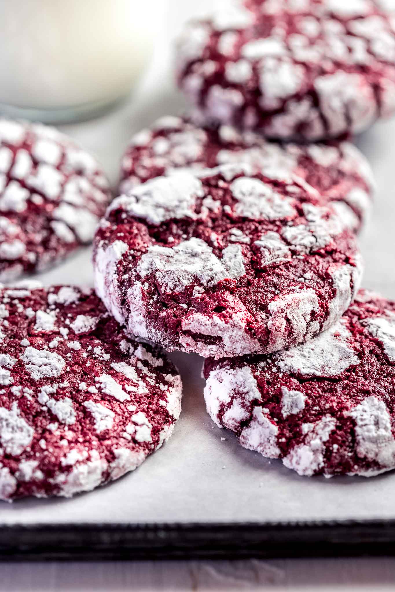 6 red velvet cookies on a tray