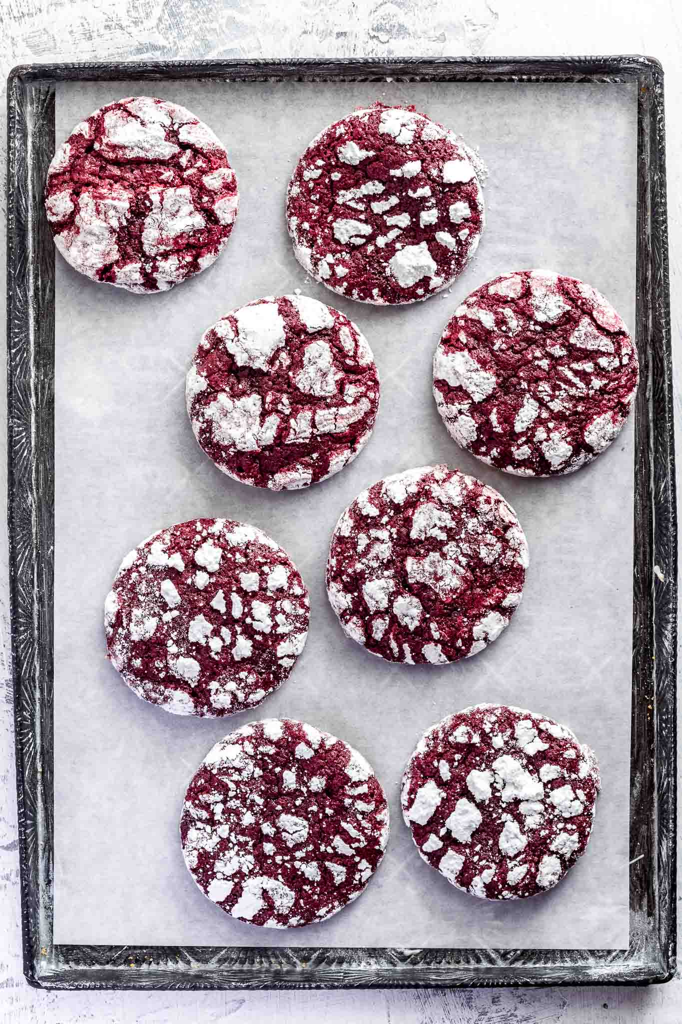 8 red velvet crinkle cookies on a vintage tray