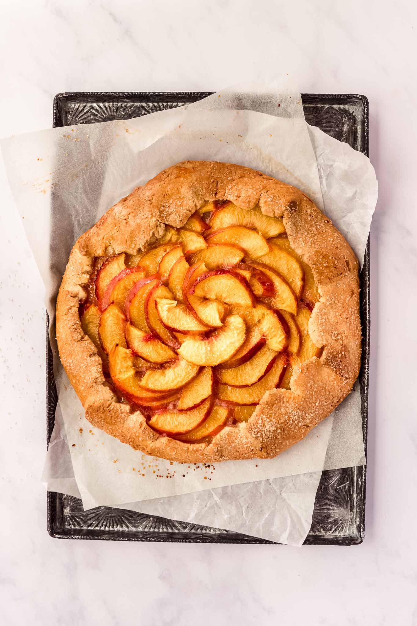 nectarine galette on a baking tray