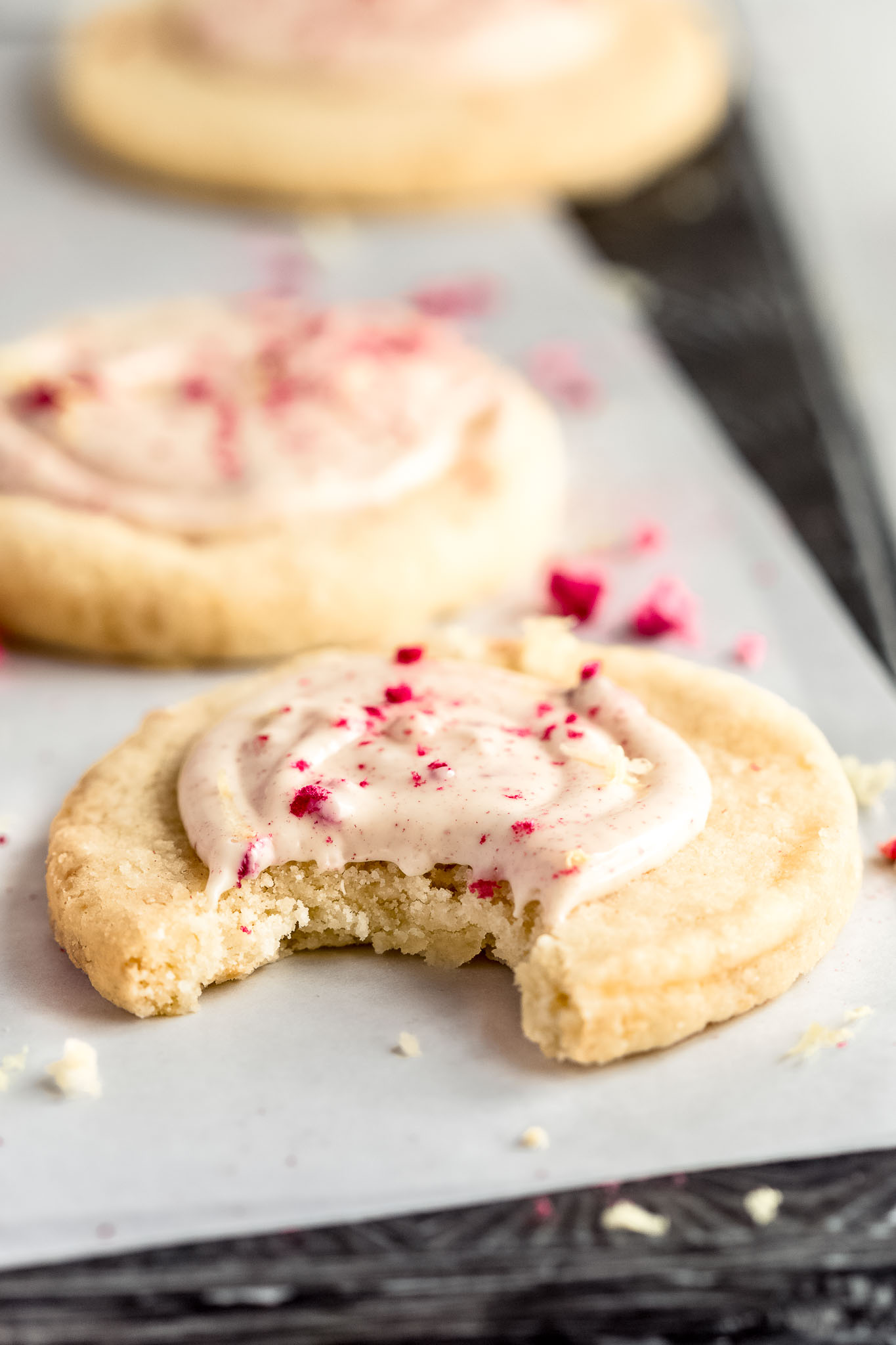 lemon shortbread cookies, topped with white chocolate and freeze dried raspberries