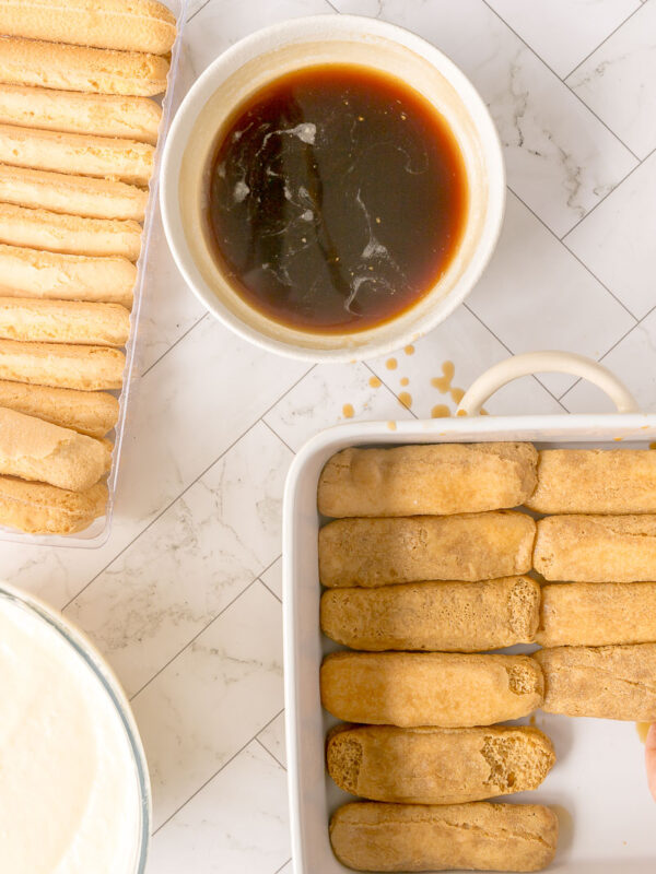 soaking lady finger biscuits in espresso, then lining the base of your dish with the soaked fingers