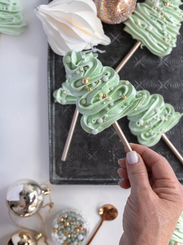 green meringue cookies in the shape of a christmas tree