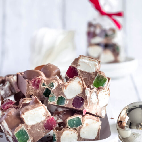 squares of Christmas rocky road on a white plate