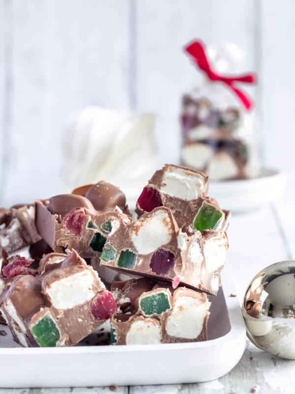 squares of Christmas rocky road on a white plate