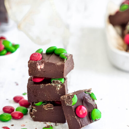 4 pieces of chocolate fudge, topped with red and green M7Ms