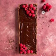 A simple but delicious chocolate raspberry tart, made with crushed Tim Tam biscuits.