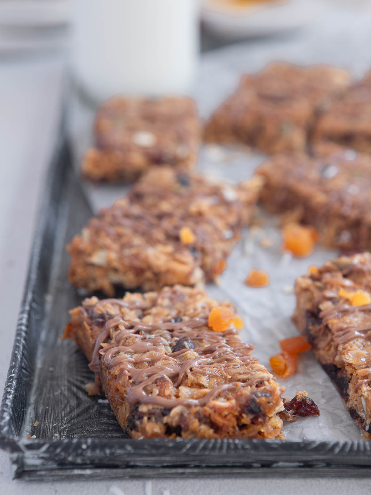 Homemade cinnamon granola bars on a vintage tray