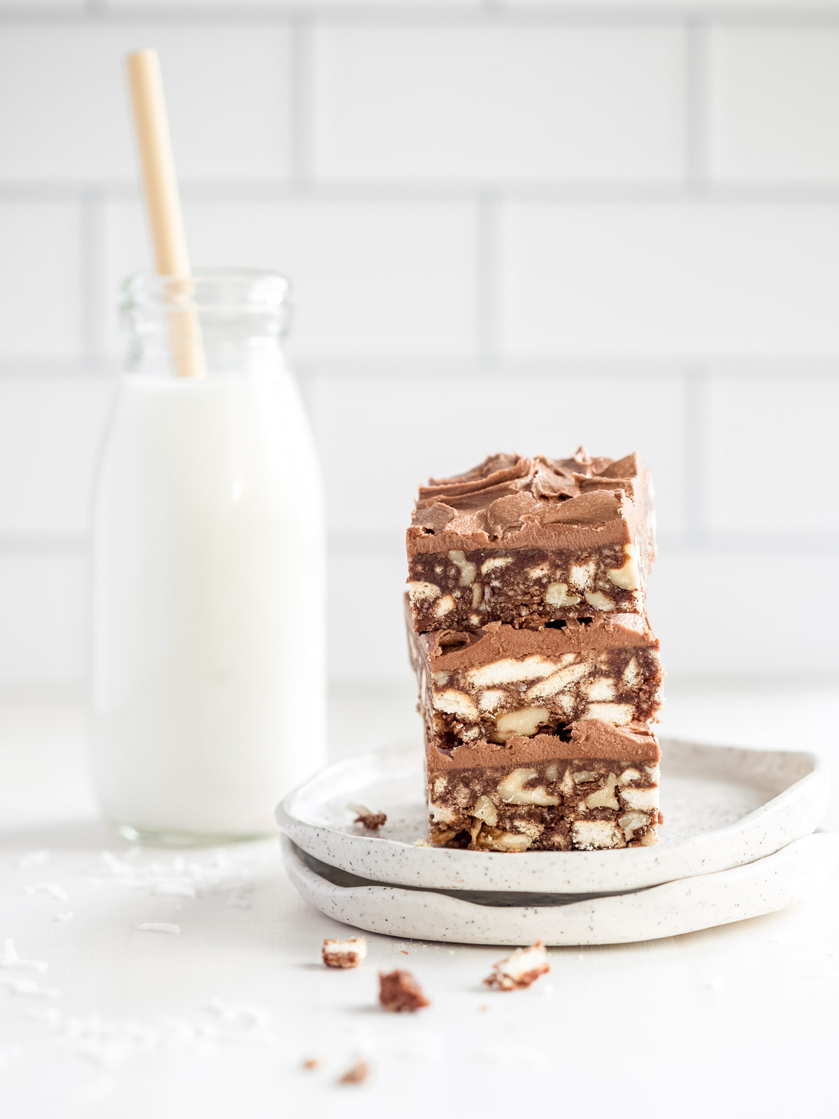 No-bake hedgehog slice, cut into squares and served with a bottle of milk.