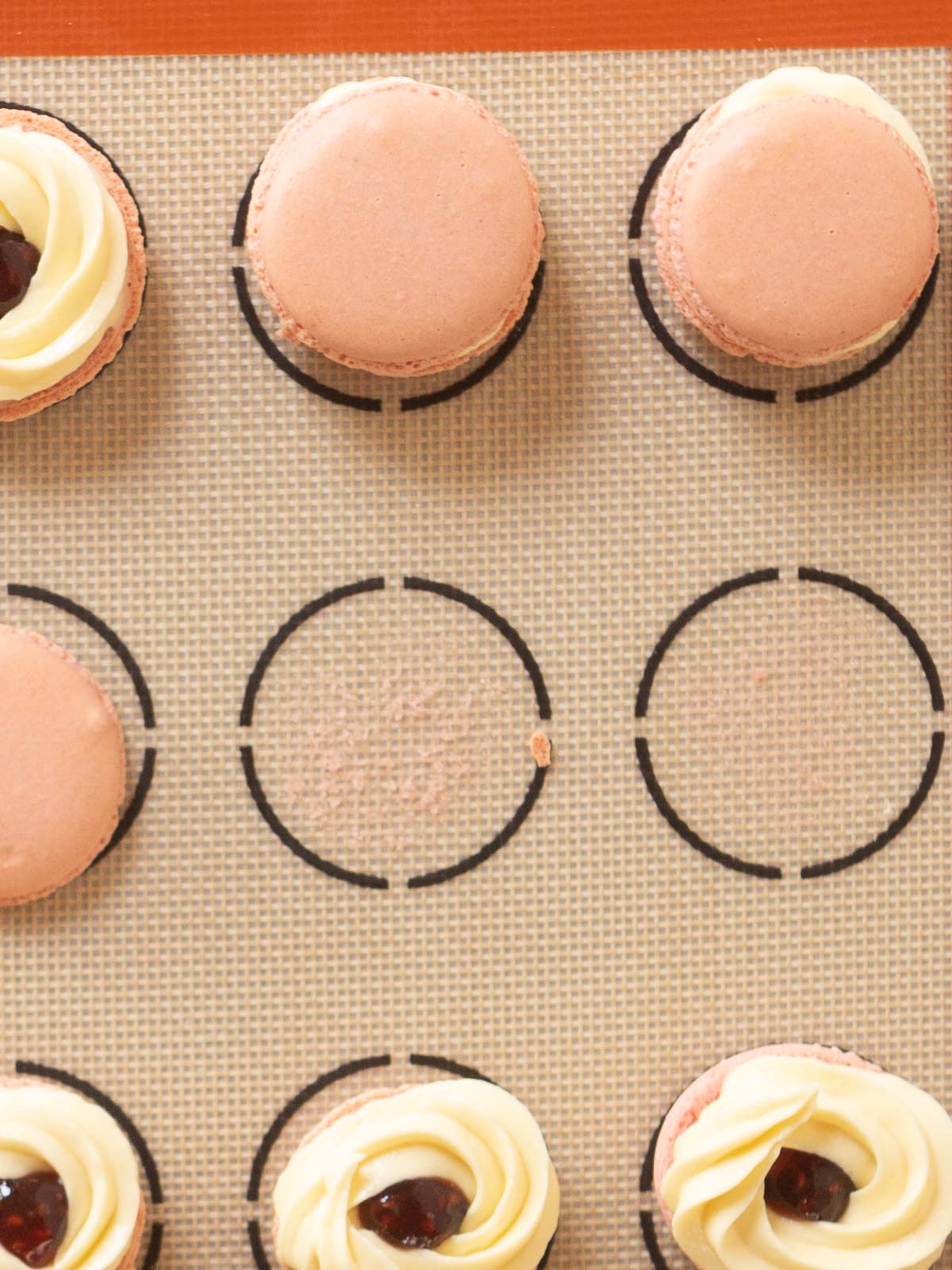 process shot for raspberry macarons with white chocolate ganache