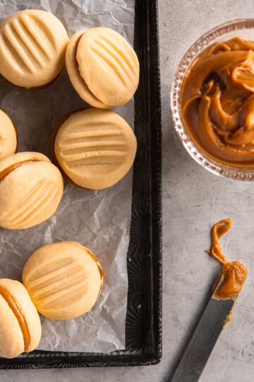Salted caramel melting moments on a tray.