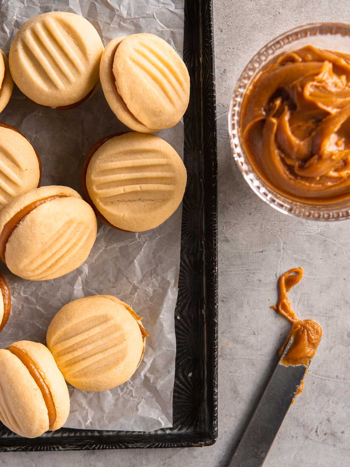 Salted caramel melting moments on a tray.