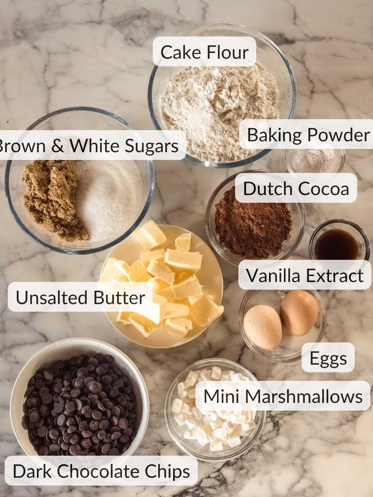 Ingredients required to make chocolate marshmallow cookies.