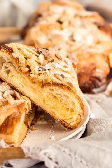 Make your own flaky almond croissants, using day old croissants and a delicious almond filling.