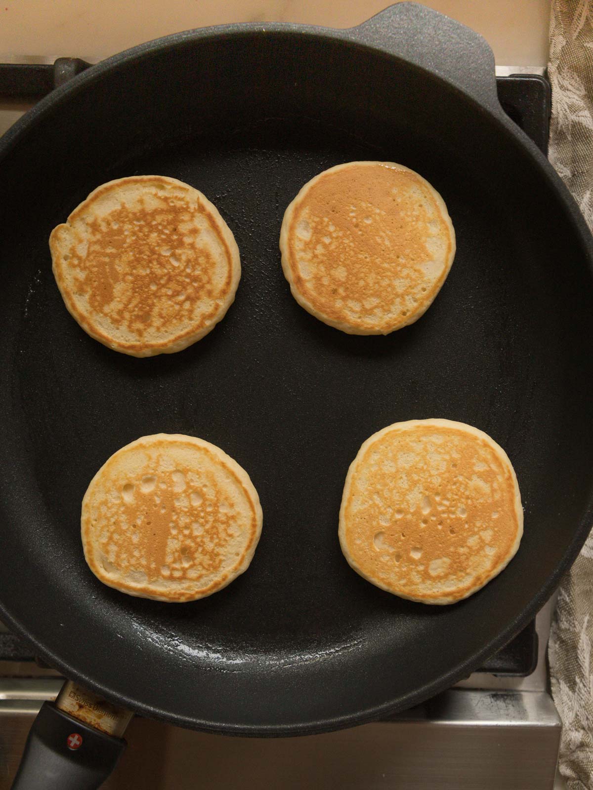 An easy pikelet recipe that makes 16 fluffy, golden little pancakes. Cook 4 at a time in a non-stick frypan.
