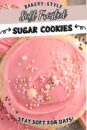 Ingredients to make soft, pink frosted sugar cookies with colourful sprinkles.