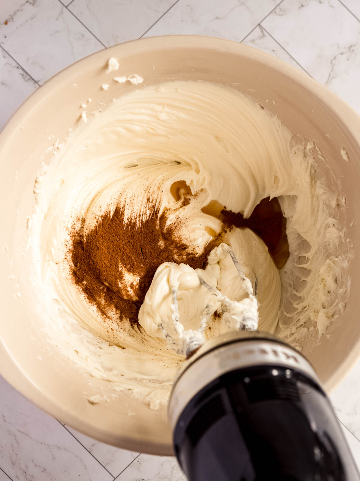 Making the filling for my banana chocolate cheesecake.