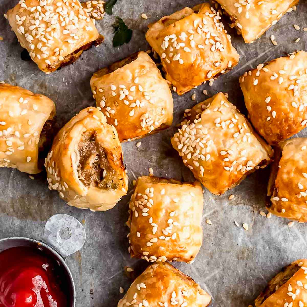 Easy homemade sausage rolls on a tray.