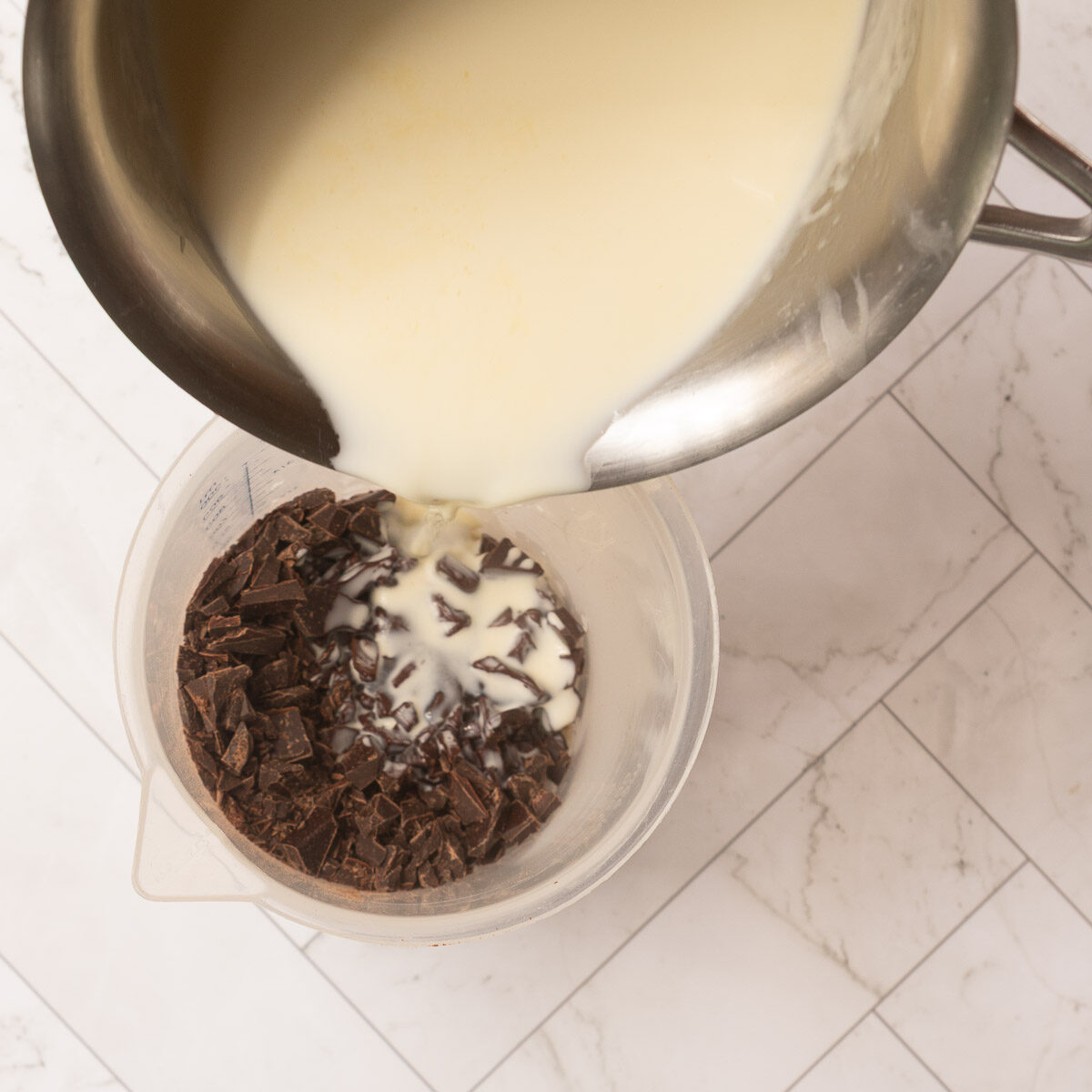 Process shot for a chocolate and raspberry tart.