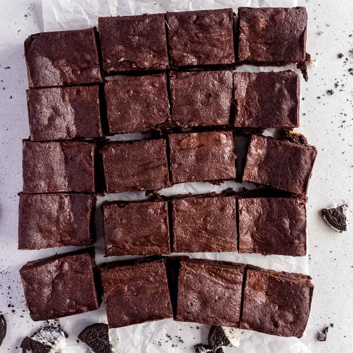 Baked triple layer brownies, cooled and cut into slices.