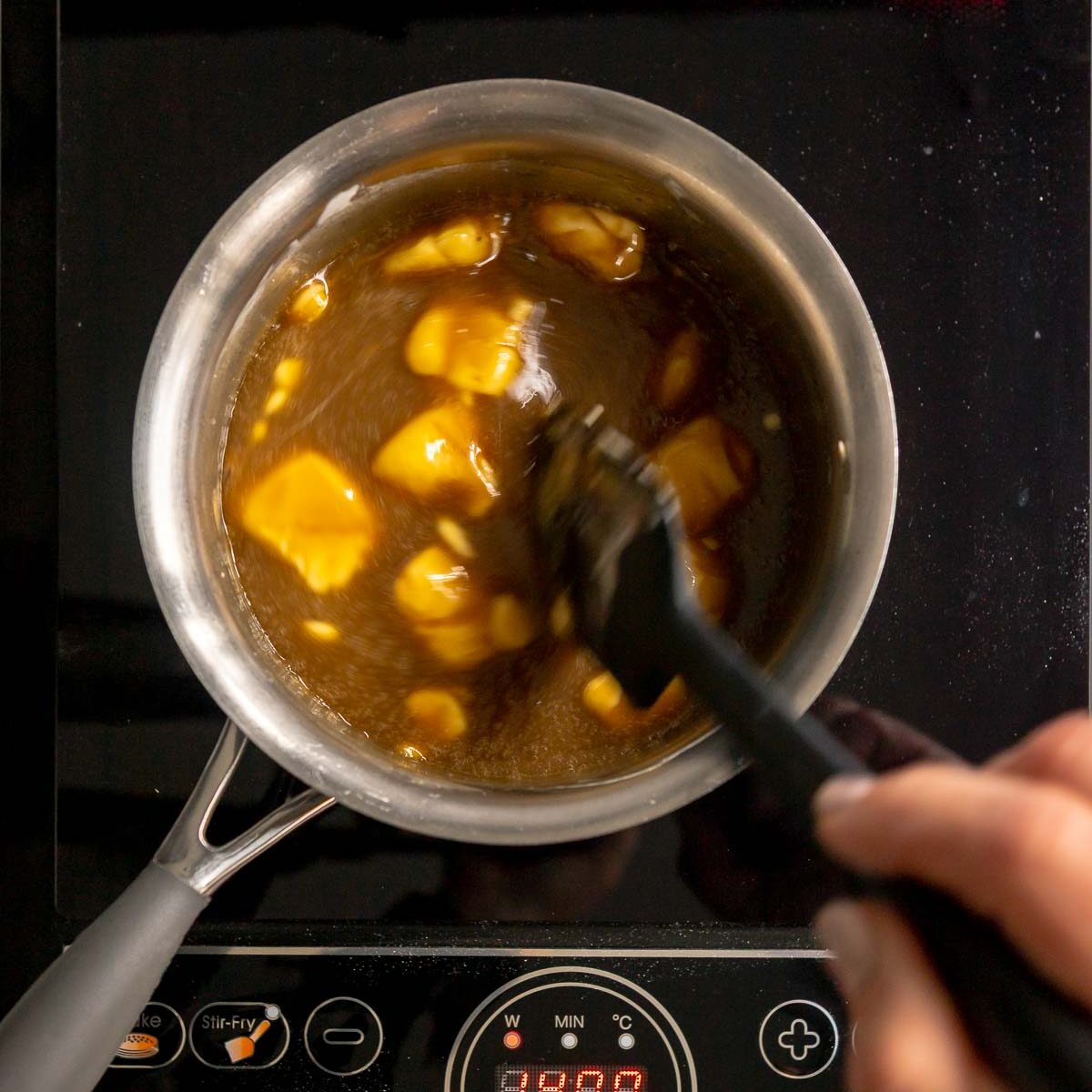 To make butterscotch sauce, melt butter and sugar with cream in a small saucepan.