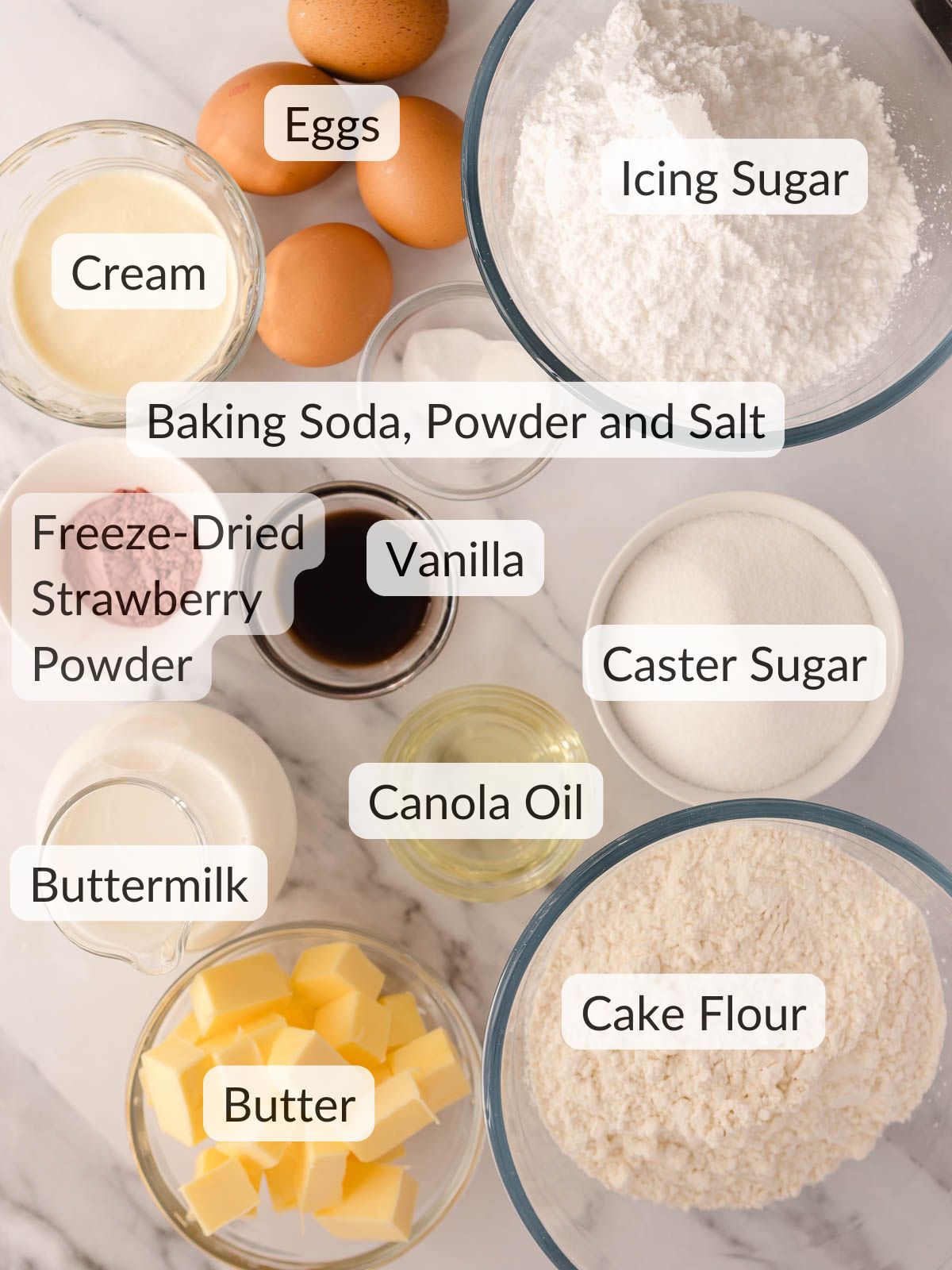 Ingredients needed to make the softest vanilla cake and natural strawberry buttercream.