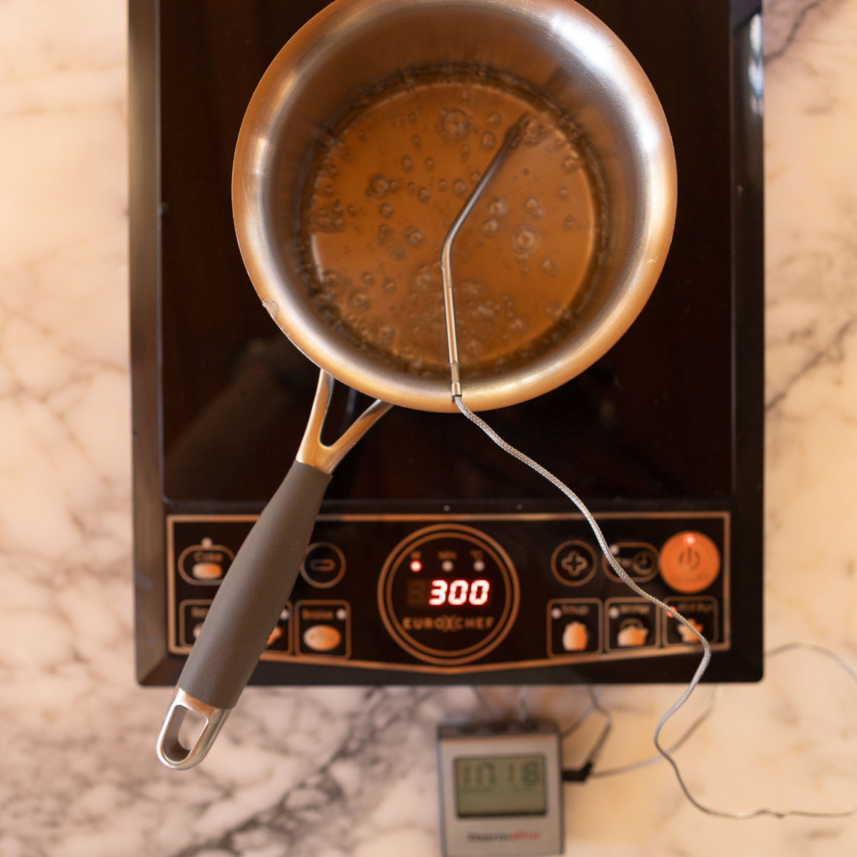 Making a sugar syrup, to add to whipped egg whites. This will make an Italian meringue for the macarons.
