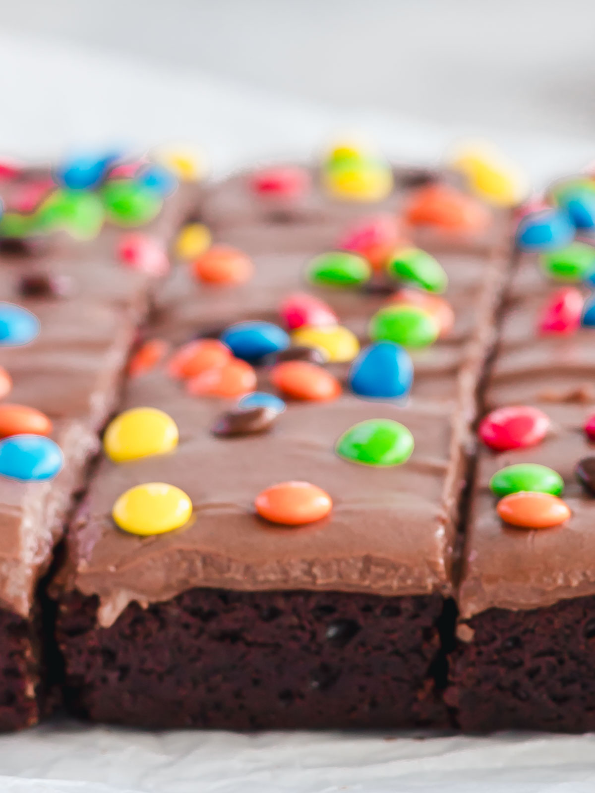 Fudgy chocolate frosting that's been spread onto chocolate brownies to make Cosmic Brownies.