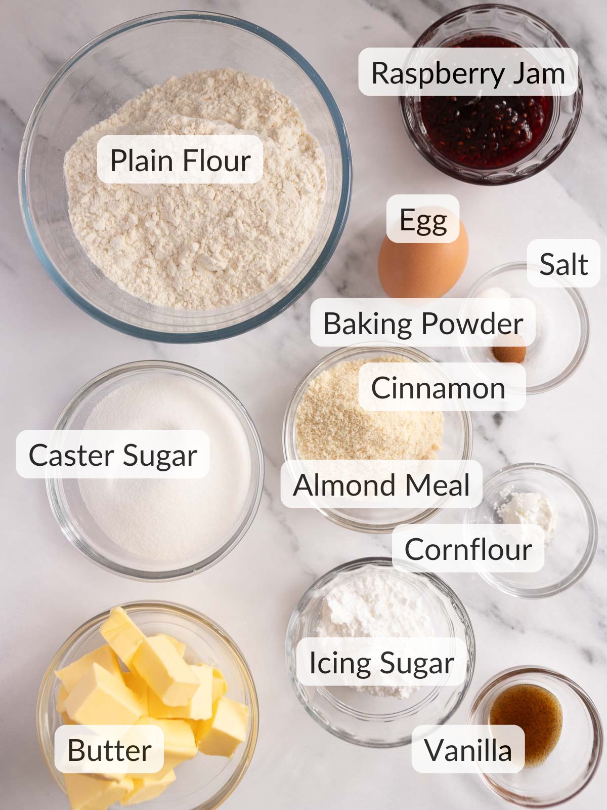 Ingredients needed to make raspberry linzer cookies.