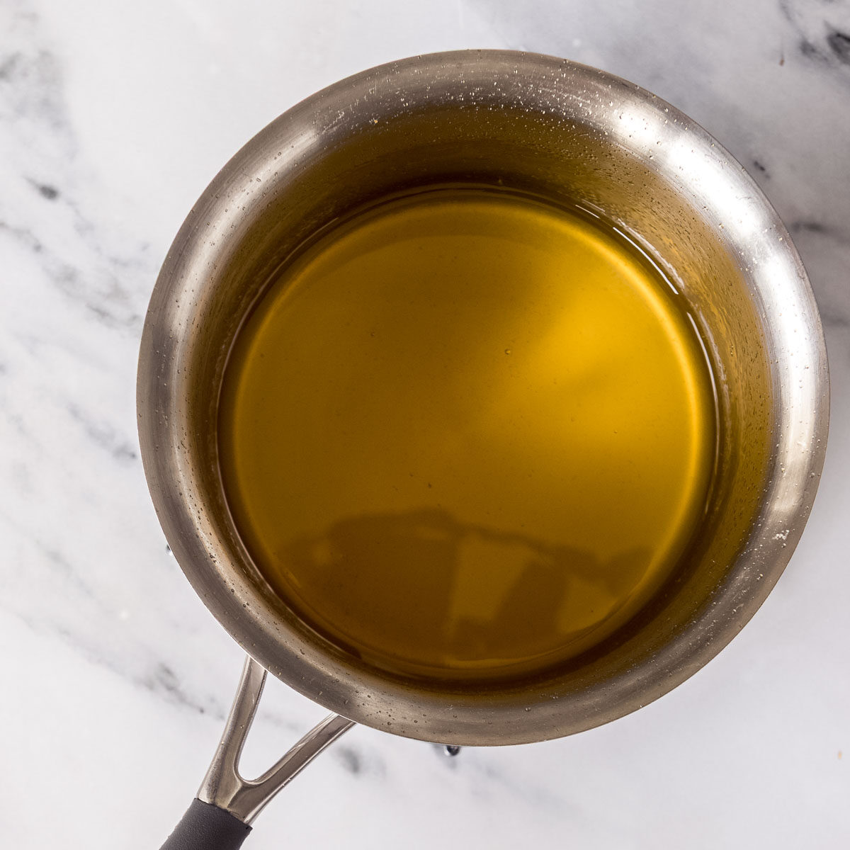 Making a simple citrus syrup, to pour over the baked cake.